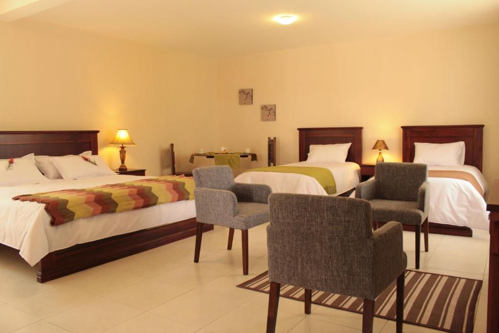 Hotel La Quinta San Andrés Ibarra Habitación foto