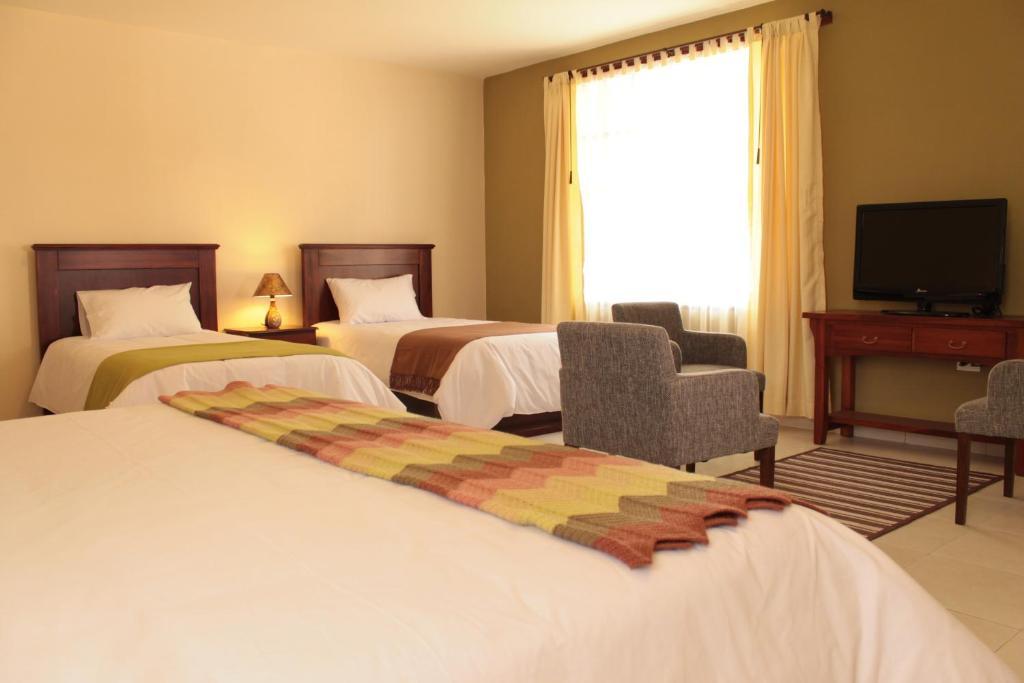 Hotel La Quinta San Andrés Ibarra Habitación foto